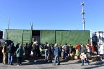 Boxes of gifts being loaded onto the Reading Boxcar # 19028